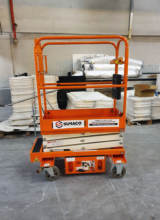 One of the Sumaco branded Snorkel S3010P push-around mini scissor lifts ready for action on the jobsite